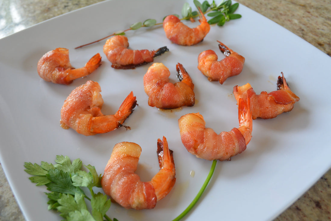 Bacon-wrapped shrimp glazed with maple honey.